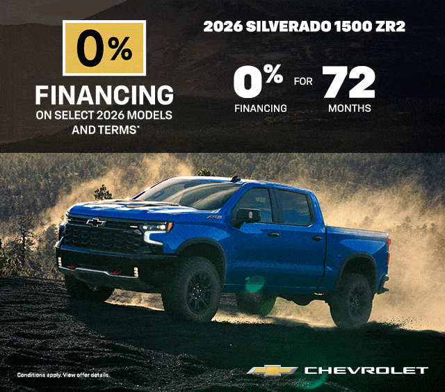 Red 2026 Chevrolet Silverado 1500 Custom Crew Cab on a road, promoting Truck Month.