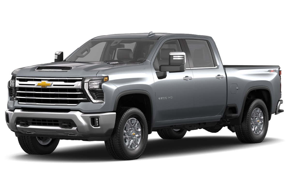 Silver heavy-duty truck with a sleek design, front grille, and side mirrors.